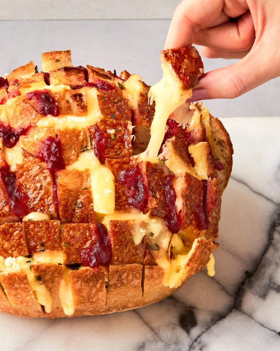 pull apart bread with cheese and cranberry sauce