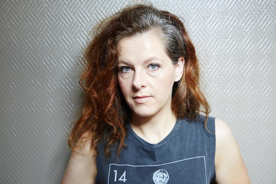 This July 9, 2013 photo shows singer-songwriter Neko Case posing in New York. Case's latest album, "The Worse Things Get, the Harder I Fight, the Harder I Fight, the More I Love You," was released this week. (Photo by Dan Hallman/Invision/AP)