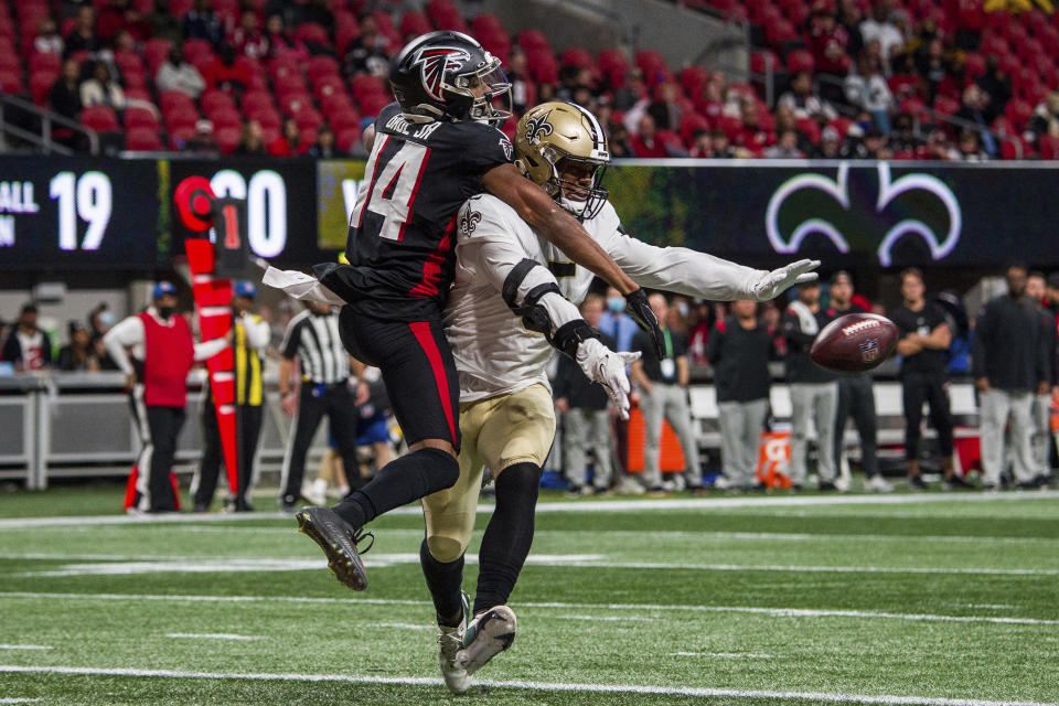 FILE - New Orleans Saints middle linebacker Kwon Alexander (5) works against Atlanta Falcons wide receiver Russell Gage (14) during the second half of an NFL football game, Sunday, Jan. 9, 2022, in Atlanta. Kwon Alexander is reuniting with Robert Saleh and adding a veteran presence to the New York Jets' linebacker corps. The 27-year-old Alexander signed a one-year deal with the Jets on Friday, July 29, 2022, a move that came after the team worked him out during the offseason. (AP Photo/Danny Karnik, File)