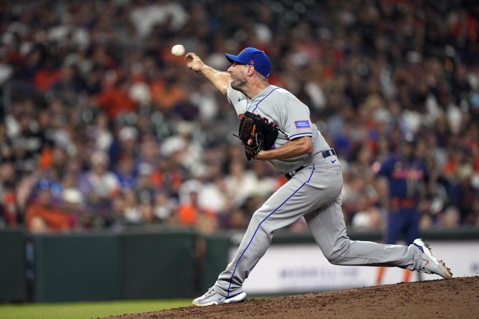 New York Mets starting pitcher Max Scherzer throws during the fifth inning of a baseball game against the Houston Astros Monday, June 19, 2023, in Houston. (AP Photo/David J. Phillip)