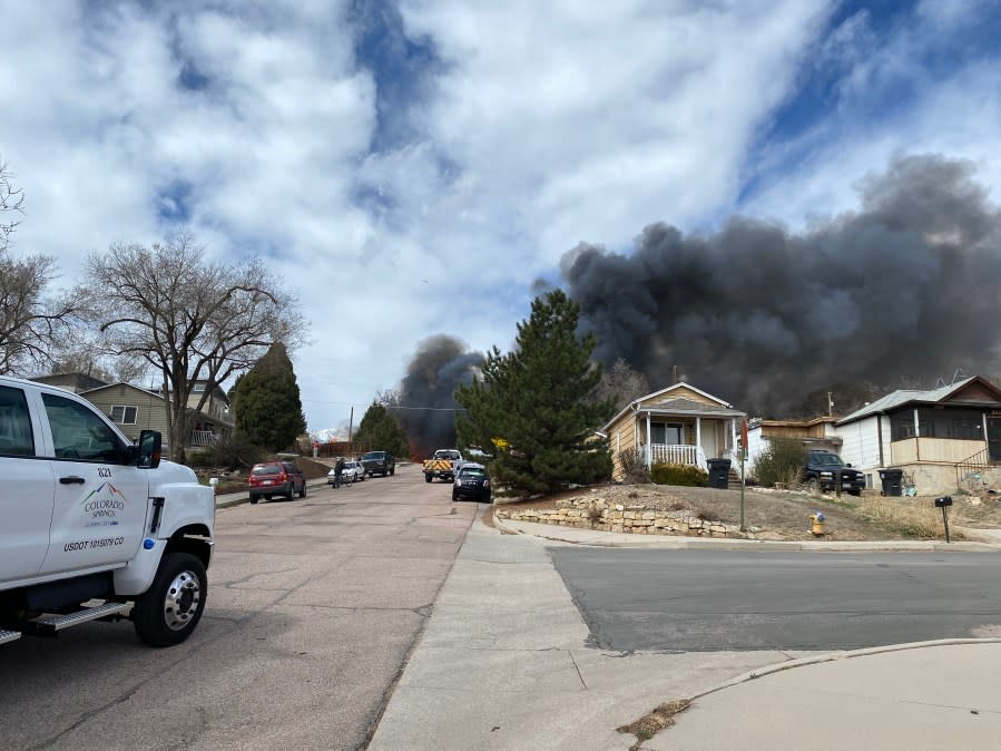 Black smoke coming from a house fire