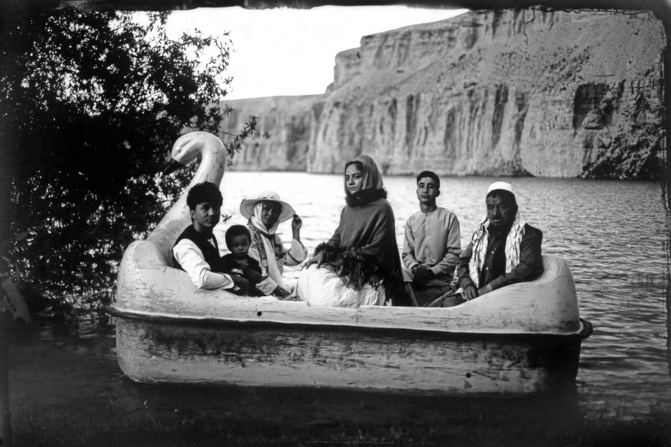 The Moradi family sits for a portrait on a small boat in Band-i-Mir lake, one of the tourist attractions in the Bamiyan Valley region in Afghanistan, Saturday, June 17, 2023. The family traveled a long way from Helmand to spend a few days for their summer vacation. During their first stint in power from 1996 to 2001, the Taliban banned photography of humans and animals as contrary to the teachings of Islam. Many box cameras were smashed, though some were quietly tolerated, Afghan photographers say. But it was the advent of the digital age that sounded the device’s death knell. (AP Photo/Rodrigo Abd)