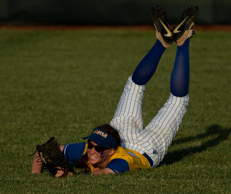 Castle's Molly Bartz (18) pulls in a Central line drive to center field during their sectional championship game at North High School Saturday evening, May 28, 2022. Bartz made the catch and two other diving catches in the game.