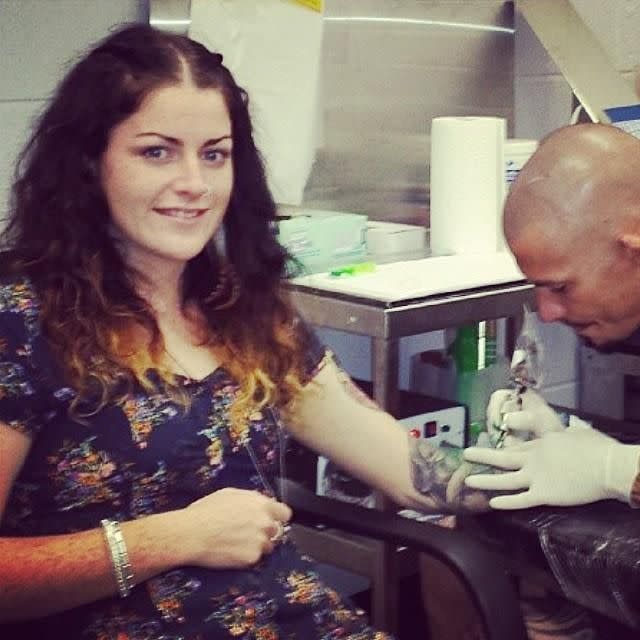 Karise Eden getting inked to compliment her new image. Source: Instagram/kariseeden