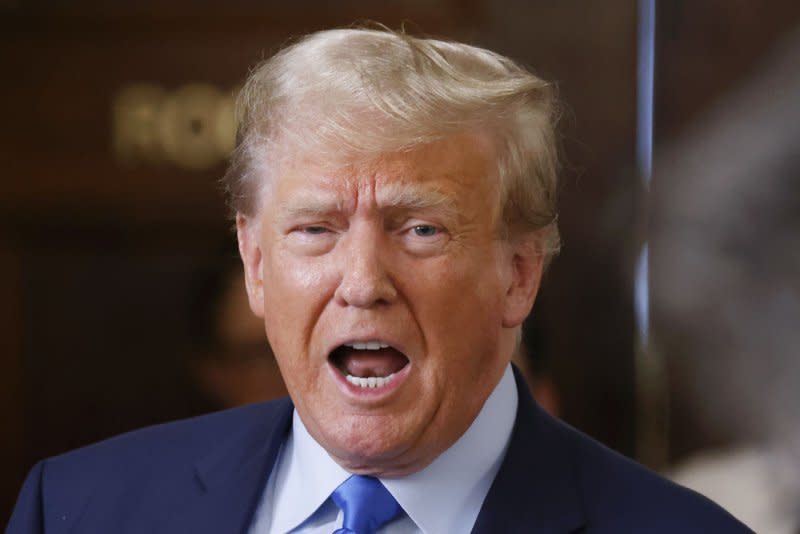 Former President Donald Trump speaks with reporters during a lunch break on the opening day of his civil fraud trial on Monday, using the opportunity to denounce Judge Arthur Engoron and New York State Attorney General Letitia James. Photo by John Angelillo/UPI