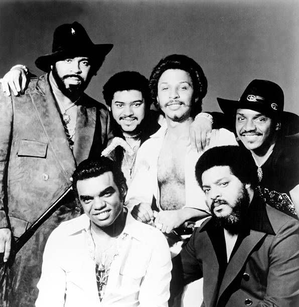 <p>Founded in 1959, the Isley brothers grew up in the church choir and formed a harmony quartet coached by their dad. <a href="https://www.amazon.com/Shout-Pts-1-2/dp/B013XBW1OA/?tag=syn-yahoo-20&ascsubtag=%5Bartid%7C10063.g.35225069%5Bsrc%7Cyahoo-us" rel="nofollow noopener" target="_blank" data-ylk="slk:“Shout”;elm:context_link;itc:0;sec:content-canvas" class="link ">“Shout”</a> was their first success in 1959, followed by a few other hits including <a href="https://www.amazon.com/Its-Your-Thing/dp/B00137V0QM/?tag=syn-yahoo-20&ascsubtag=%5Bartid%7C10063.g.35225069%5Bsrc%7Cyahoo-us" rel="nofollow noopener" target="_blank" data-ylk="slk:"It’s Your Thing";elm:context_link;itc:0;sec:content-canvas" class="link ">"It’s Your Thing"</a> (1969). The group added the two younger brothers and rewrote “<a href="https://www.amazon.com/That-Lady-Pts-1-2/dp/B013WOO54W/?tag=syn-yahoo-20&ascsubtag=%5Bartid%7C10063.g.35225069%5Bsrc%7Cyahoo-us" rel="nofollow noopener" target="_blank" data-ylk="slk:That Lady;elm:context_link;itc:0;sec:content-canvas" class="link ">That Lady</a>” (originally released in 1964) in 1973, when it charted #21 for the year. The brothers went on to release multiple million-selling albums throughout the '70s. </p>