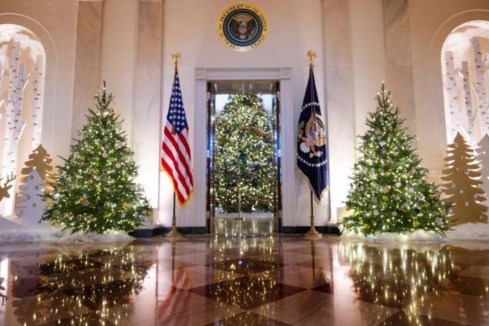 Christmas decorations are on display in the Grand Foyer of the White House in 2022