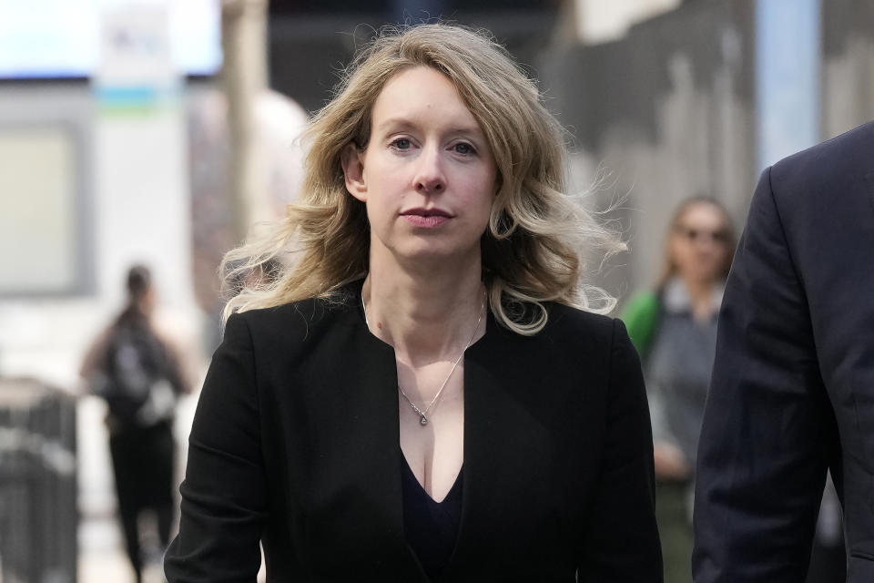 FILE - Former Theranos CEO Elizabeth Holmes leaves federal court in San Jose, Calif., March 17, 2023. A panel of appeals court judges will preside over oral arguments on Tuesday, June 11, 2024, in an attempt to overturn the 2022 fraud conviction of Holmes in the high-profile case that exposed the greed and hubris infecting Silicon Valley. (AP Photo/Jeff Chiu, File)
