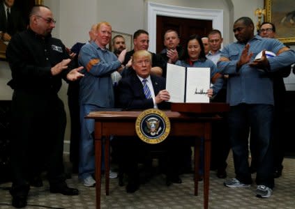 U.S. President Donald Trump is after signing a proclamation to establish tariffs on imports of steel and aluminum at the White House in Washington, U.S., March 8, 2018. REUTERS/Leah Millis