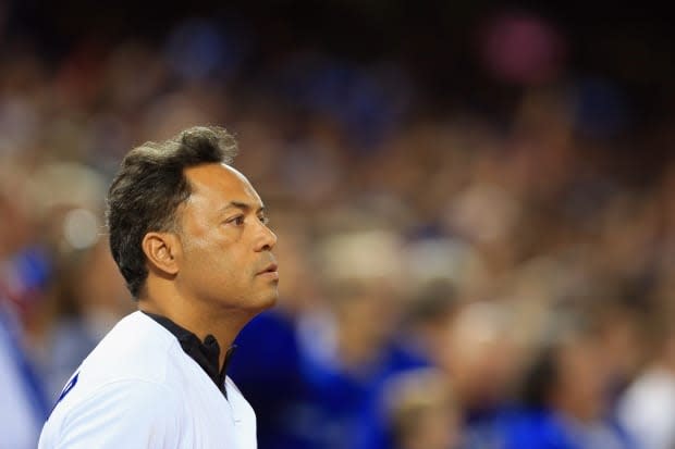 Hall of Famer Roberto Alomar has been fired by MLB amid a sexual misconduct allegation, according to a statement the league released Friday. (Vaughn Ridley/Getty Images - image credit)