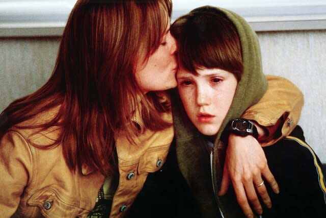 from left: Robin Wright, Spencer Treat Clark in UNBREAKABLE (2000)