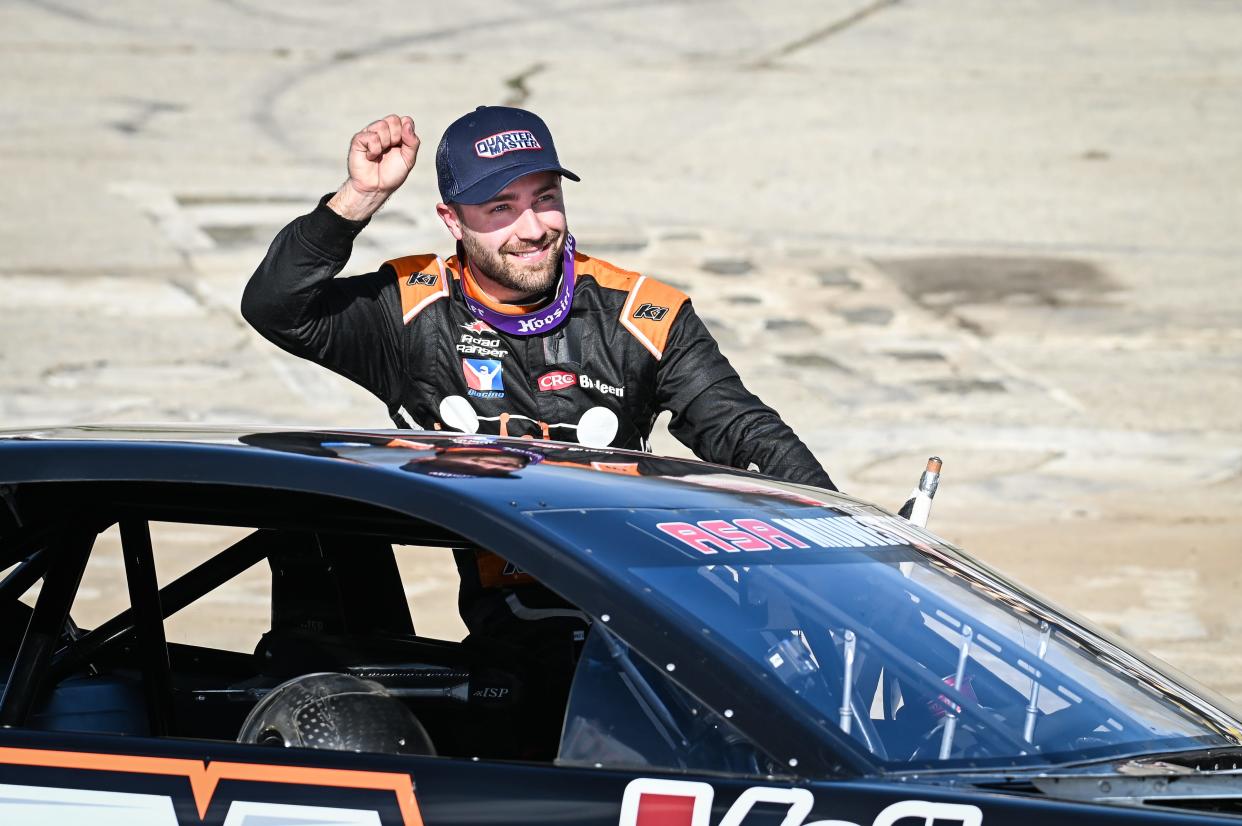 Ty Majeski celebrates in victory lane after winning the the Jerry "Bear" Priesgen Memorial on Sunday at Slinger Speedway.