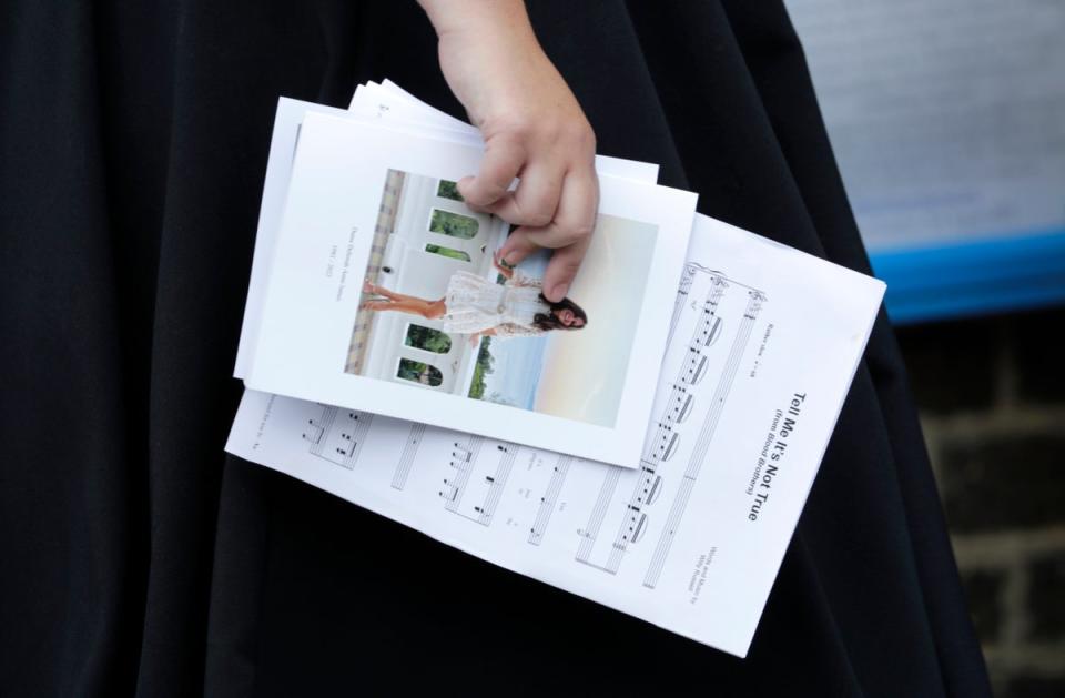 Sheet music and an order of service held by Natalie Rushdie as she attends the funeral of Dame Deborah James at St Mary's Church (Getty Images)