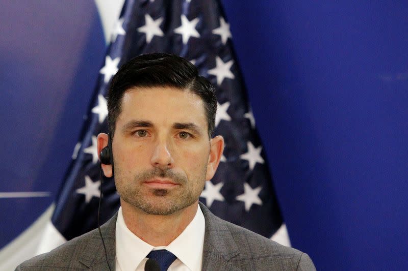 U.S. Department of Homeland Security (DHS) acting Secretary Chad Wolf looks on during a joint message with Honduras' President Hernandez (not pictured), in Tegucigalpa