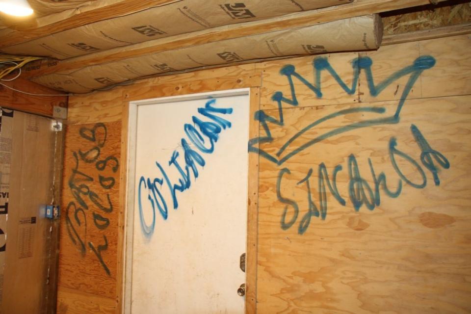 Graffiti on a wall at an illegal marijuana grow in Northern California glorifies Mexico's infamous Sinaloa Cartel.