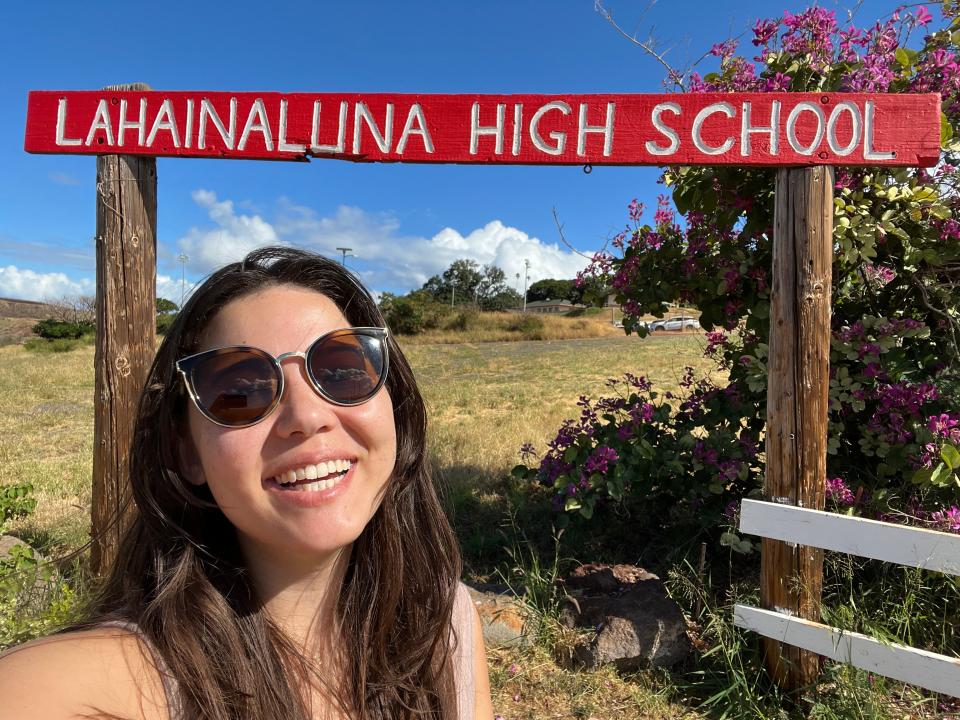 The writer in front of her alma mater, Lahainauna High School