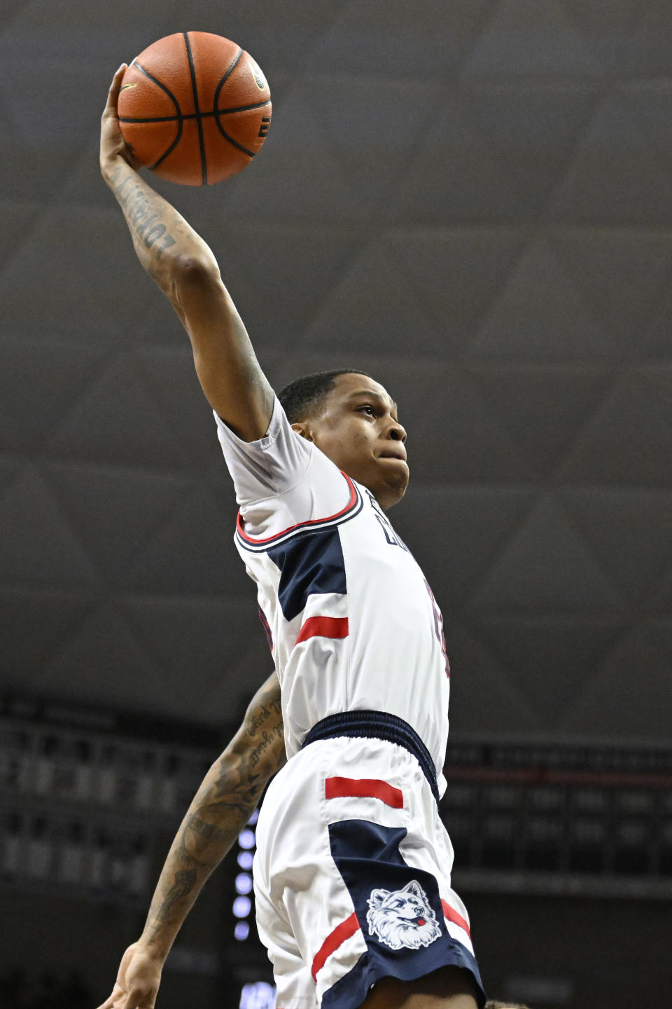 UConn's Jordan Hawkins (24) dunks in the first half of an NCAA college basketball game against Seton Hall, Saturday, Feb. 18, 2023, in Storrs, Conn. (AP Photo/Jessica Hill)