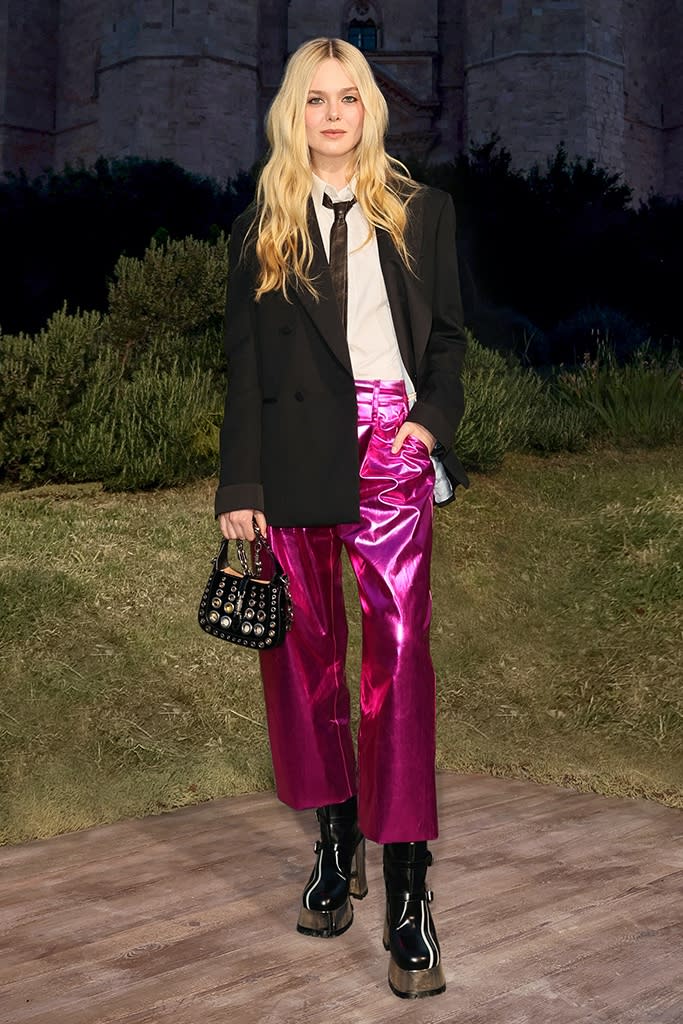 Elle Fanning attends Gucci’s “Cosmogonie” Resort 2023 runway show in Puglia, Italy on May 16, 2022. - Credit: Courtesy of Getty