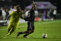 Nashville midfielder Hany Mukhtar left, holds back Inter Miami midfielder Rodolfo Pizarro as he goes for the ball, during the first half of an MLS soccer match, Wednesday, Sept. 22, 2021, in Fort Lauderdale, Fla. (AP Photo/Rebecca Blackwell)