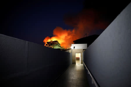 Flames rise after a rocket attack in Sderot, near the Israeli side of the Israel-Gaza border, November 12, 2018. REUTERS/ Amir Cohen