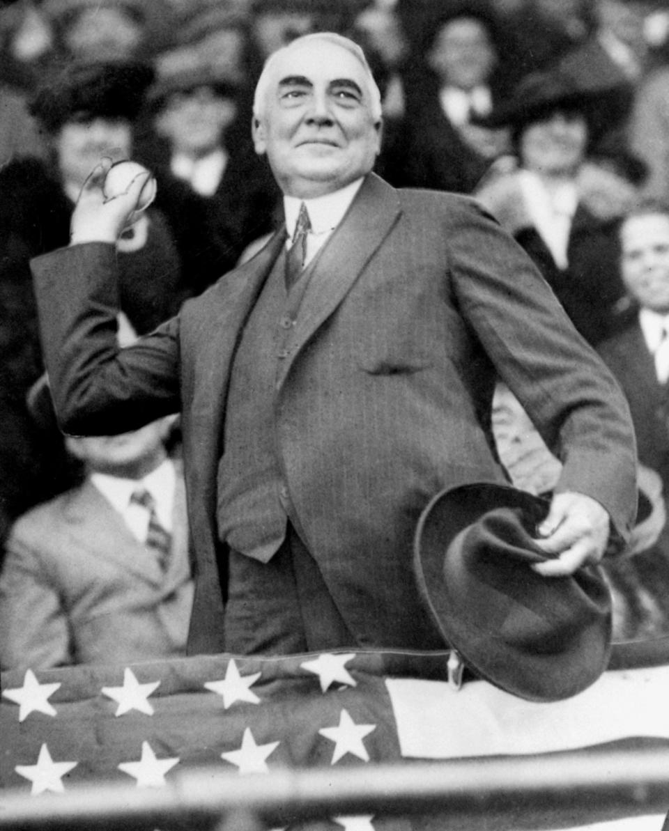 FILE - In this April 13, 1921, file photo, President Warren G. Harding throws out the first ball to open the Washington Senators' baseball season. The grandson of U.S. President Warren G. Harding has gone to court seeking to dig up the Republican's remains from the presidential memorial where they have lain since 1927. (AP Photo/FIle)