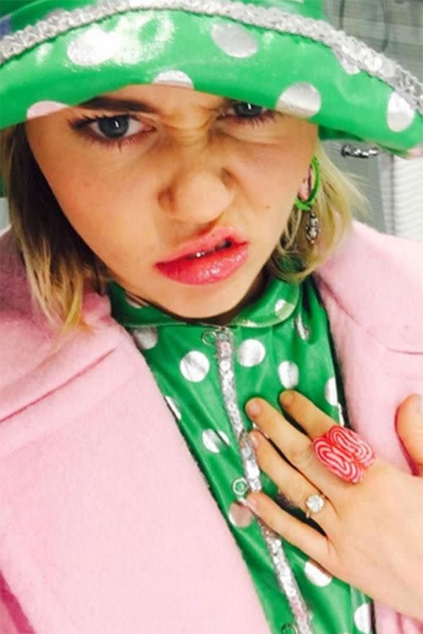Miley shows off her engagement ring. Source: Instagram