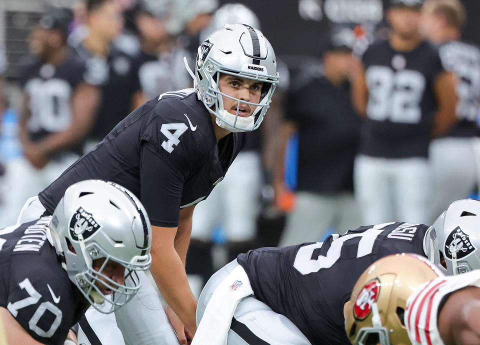 LAS VEGAS, NEVADA – AUGUST 13: Quarterback Aidan O’Connell #4 of the <a class="link " href="https://sports.yahoo.com/nfl/teams/las-vegas/" data-i13n="sec:content-canvas;subsec:anchor_text;elm:context_link" data-ylk="slk:Las Vegas Raiders;sec:content-canvas;subsec:anchor_text;elm:context_link;itc:0">Las Vegas Raiders</a> gets ready to run a play against the <a class="link " href="https://sports.yahoo.com/nfl/teams/san-francisco/" data-i13n="sec:content-canvas;subsec:anchor_text;elm:context_link" data-ylk="slk:San Francisco 49ers;sec:content-canvas;subsec:anchor_text;elm:context_link;itc:0">San Francisco 49ers</a> in the first quarter of a preseason game at Allegiant Stadium on August 13, 2023 in Las Vegas, Nevada. The Raiders defeated the 49ers 34-7. (Photo by Ethan Miller/Getty Images)