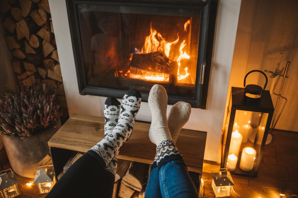 Lazy winer day in front of fire in fireplace.