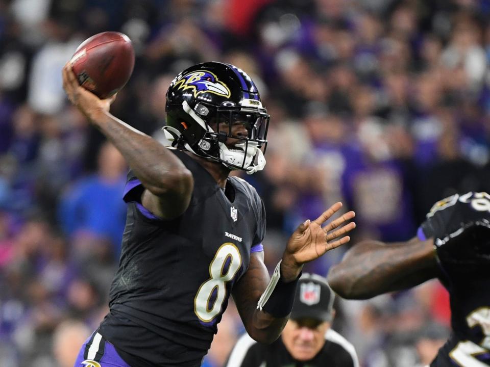 Lamar Jackson makes a throw against the Indianapolis Colts.