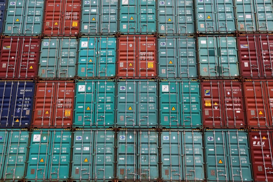 wall of blue and red shipping containers