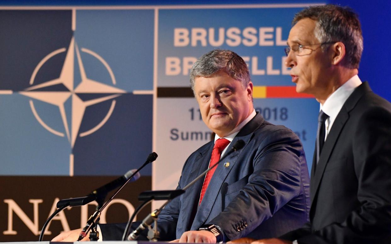 Ukraine's President Petro Poroshenko, left, and Nato Secretary-General Jens Stoltenberg - AP