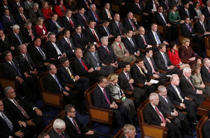 Republican members of congress listen as U.S. President Barack Obama delivers his State of the Union address to a joint session of the U.S. Congress on Capitol Hill in Washington, January 20, 2015. (REUTERS/Jonathan Ernst)