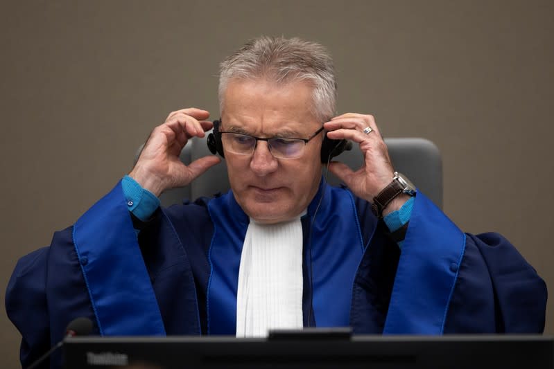 Presiding ICC judge Robert Fremr prepares to read the sentence for Congolese militia commander Bosco Ntaganda in the courtroom of the International Criminal Court in The Hague