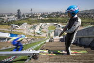 Members of Kazakhstan's national team attend training session at the Sunkar Ski Jumping complex in Almaty, Kazakhstan, July 15, 2015. REUTERS/Shamil Zhumatov