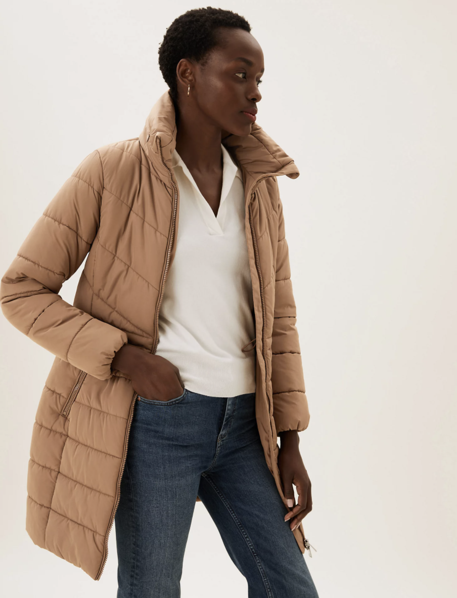 The coat comes in two hue:  blue and beige. (Marks & Spencer) 