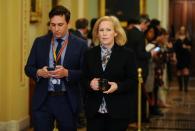 Sen. Kirsten Gillibrand (D-NY) walks to the Senate floor after a brief recess from the day's Senate impeachment trial of President Donald Trump in Washington