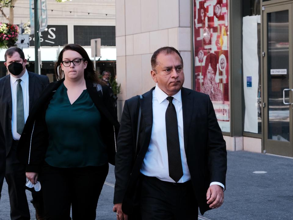 Former Theranos COO Ramesh "Sunny" Balwani and his legal team leave the Robert F. Peckham Federal Building on July 7, 2022 in San Jose, California. Balwani was found guilty on 12 counts of conspiracy and fraud for allegedly engaging in a multimillion-dollar scheme to defraud investors with Theranos blood testing lab services. Former Theranos CEO Elizabeth Holmes was was found guilty of four counts of defrauding investors in January and is awaiting sentencing.