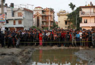 People gather near an explosion site in Kathmandu, Nepal May 26, 2019. REUTERS/Navesh Chitrakar