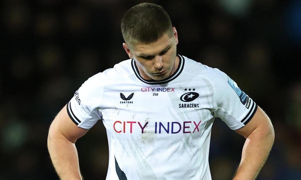 <span>Owen Farrell of Saracens cuts a dejected figure after sustaining a hamstring injury against Northampton.</span><span>Photograph: David Rogers/Getty Images</span>