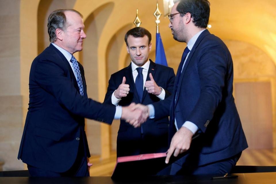 French president Emmanuel Macron alongside other delegates at Davos (Reuters)
