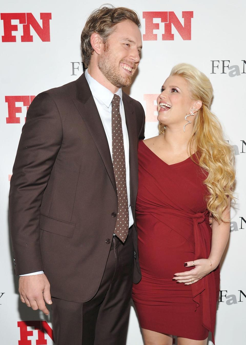 Eric Johnson (L) and recording artist/actress Jessica Simpson attend the 25th Annual Footwear News Achievement Awards at the Museum of Modern Art on November 29, 2011 in New York City
