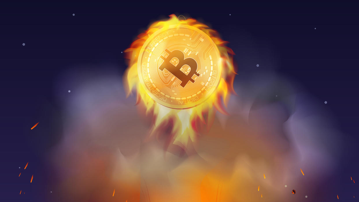  Bitcoin on fire stock image. 