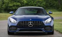 <p>With its beefy vertical bars that look like the teeth of some giant prehistoric catfish and the pie-sized three-pointed star centered in the opening, the grille dominates the appearance of this flamboyant car.</p>