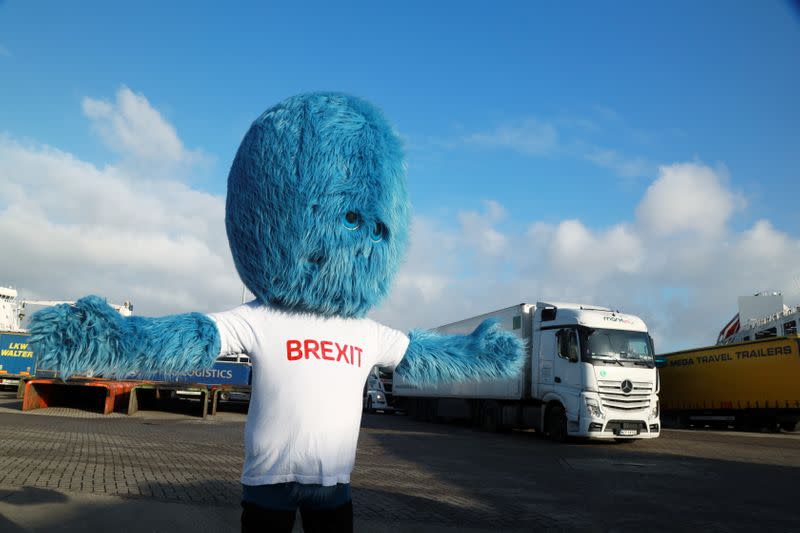 A blue furry monster known as the 'Brexit Monster' makes an appearance in the port of Rotterdam