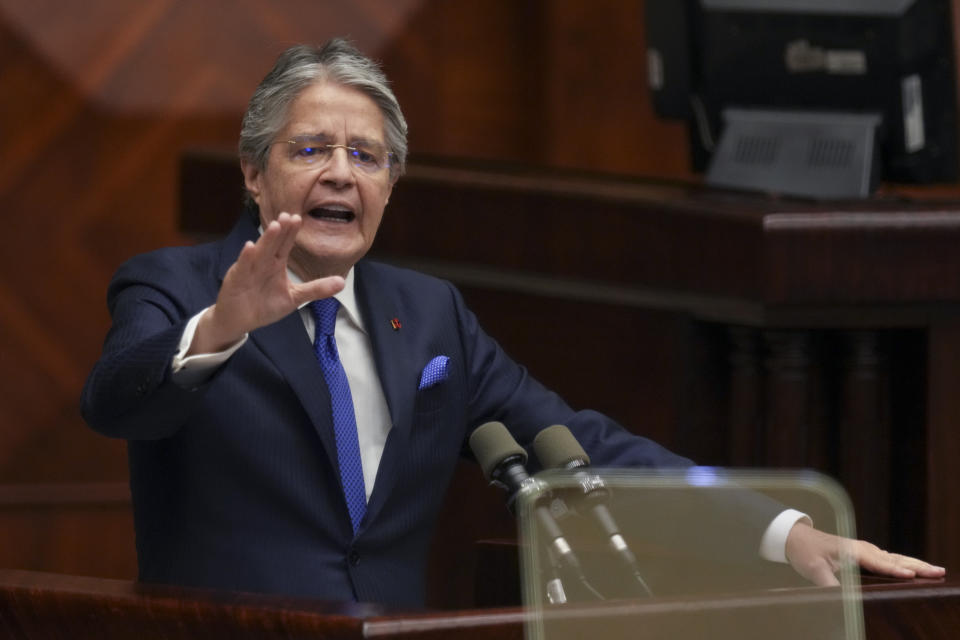 Ecuadorean President Guillermo Lasso speaks during a session by National Assembly where opposition lawmakers seek to try him for embezzlement accusations in Quito, Ecuador, Tuesday, May 16, 2023. (AP Photo/Dolores Ochoa)