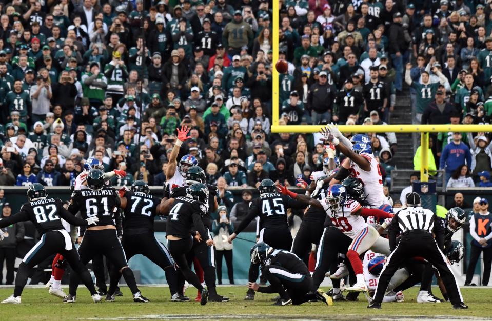 Philadelphia Eagles kicker Jake Elliott (4) kicks the go-ahead field goal to down the New York Giants, 25-22.