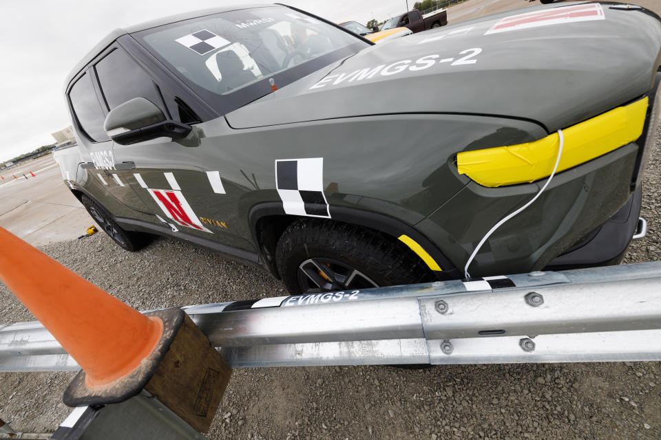 A 2022 Rivian R1T is used for a crash test research by the U.S. Army Corps of Engineers and Development Center and the University of Nebraska-Lincoln's Midwest Roadside Safety Facility on Oct. 12, 2023 in Lincoln, Neb. Preliminary tests point to concerns that the nation’s roadside guardrails are no match for new heavy electric vehicles. (Craig Chandler/University of Nebraska via AP)