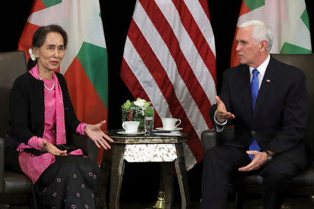 Myanmar's State Counsellor Aung San Suu Kyi and U.S. Vice President Mike Pence hold a bilateral meeting in Singapore, November 14, 2018. REUTERS/Athit Perawongmetha