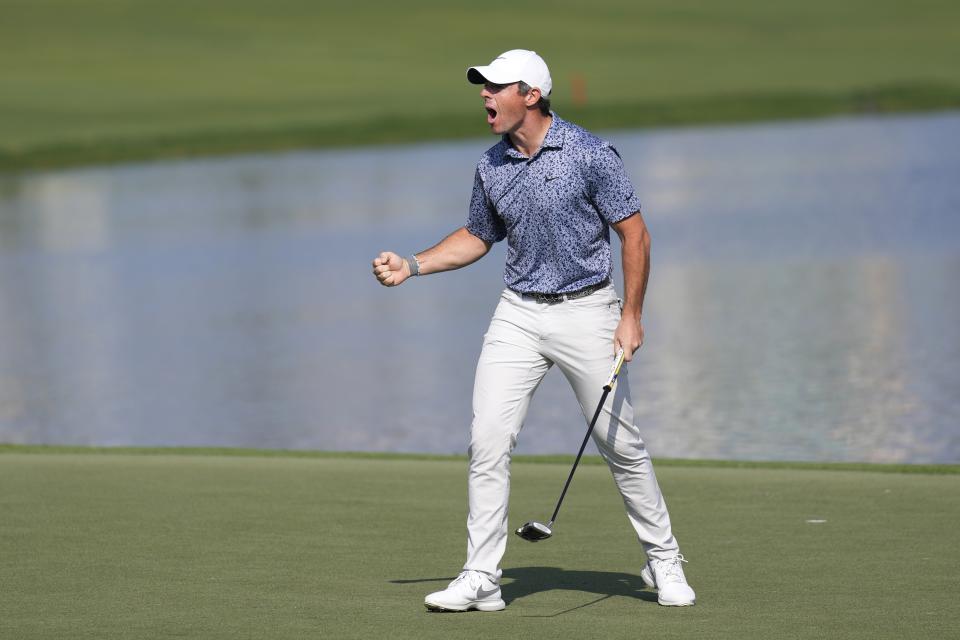 Rory McIlroy of Northern Ireland celebrates after he won the the Dubai Desert Classic, in Dubai, United Arab Emirates, Monday, Jan. 30, 2023. (AP Photo/Kamran Jebreili)