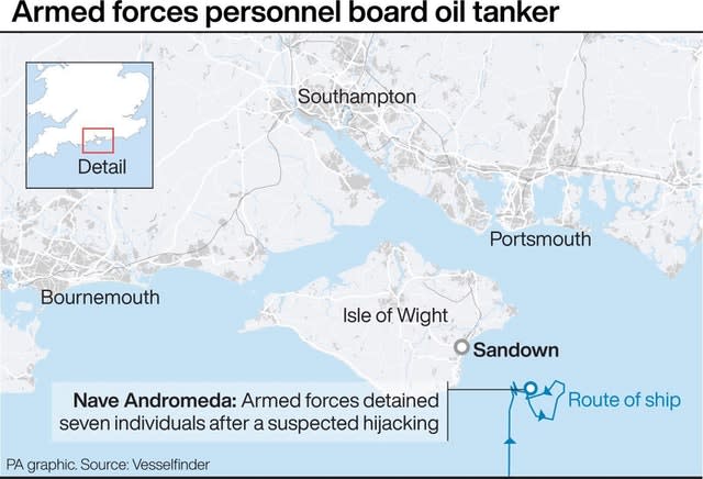 Armed forces personnel board oil tanker